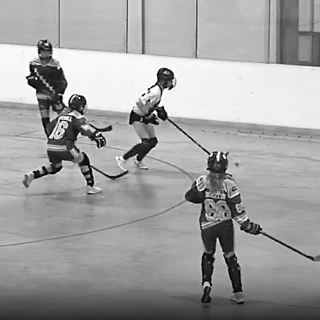 Team Alberta Girls playing a ball hockey game at Nationals